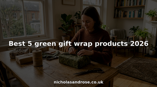 Woman wrapping gift in reusable green fabric at home