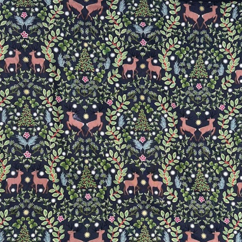 A fabric gift wrap with a festive winter design, featuring reindeer and snowflakes pattern. 
Luxury, eco-friendly, embroidery personalisation 